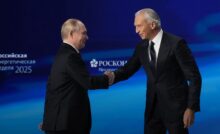 Владимир Путин и Александр Дюков на полях РЭН