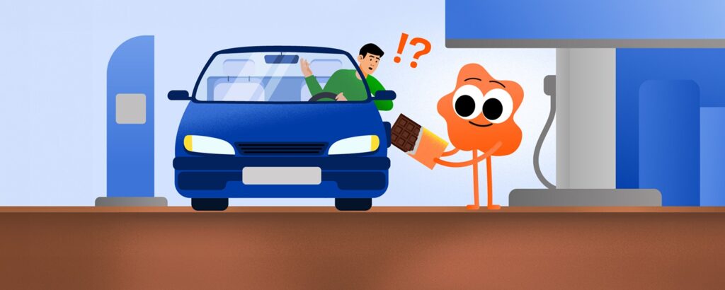 Мультипликационный персонаж «Энергии+» пробует заправлять машину плиткой шоколада